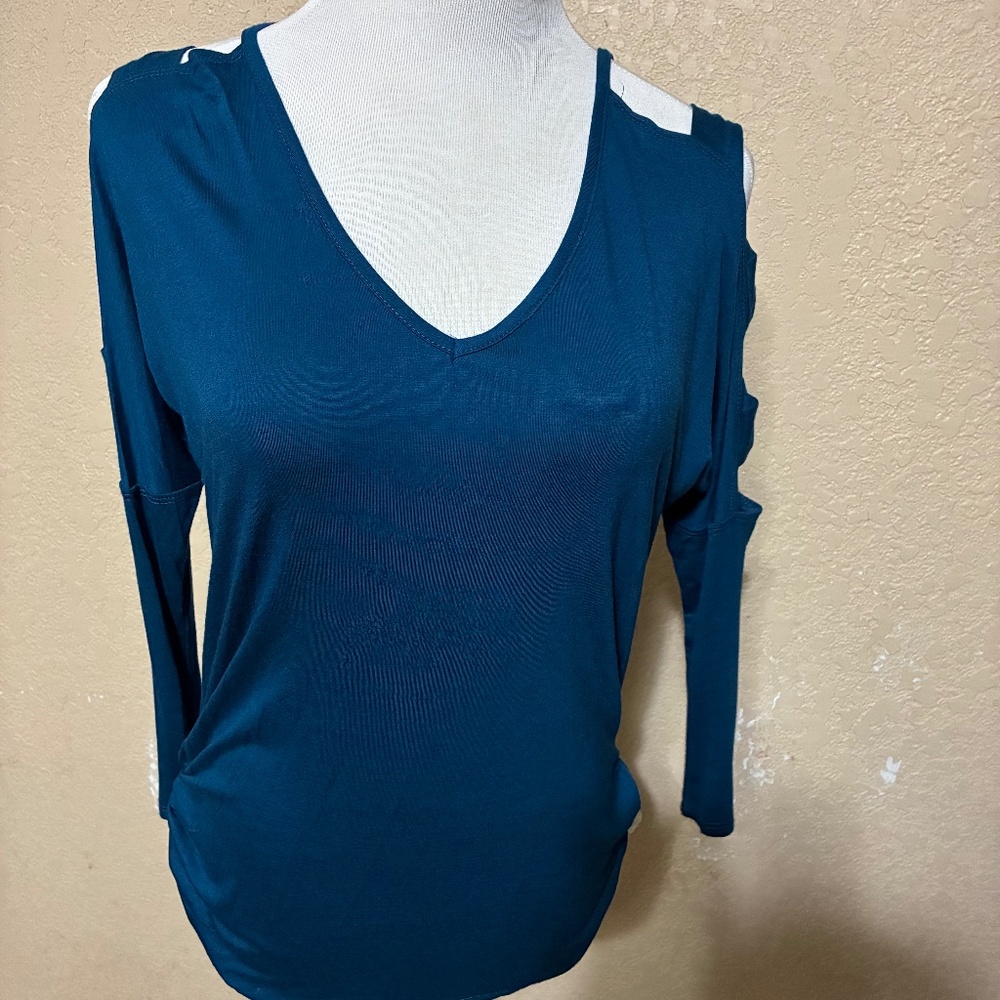 Lovely blue color  ladder sleeve blouse. Emerald